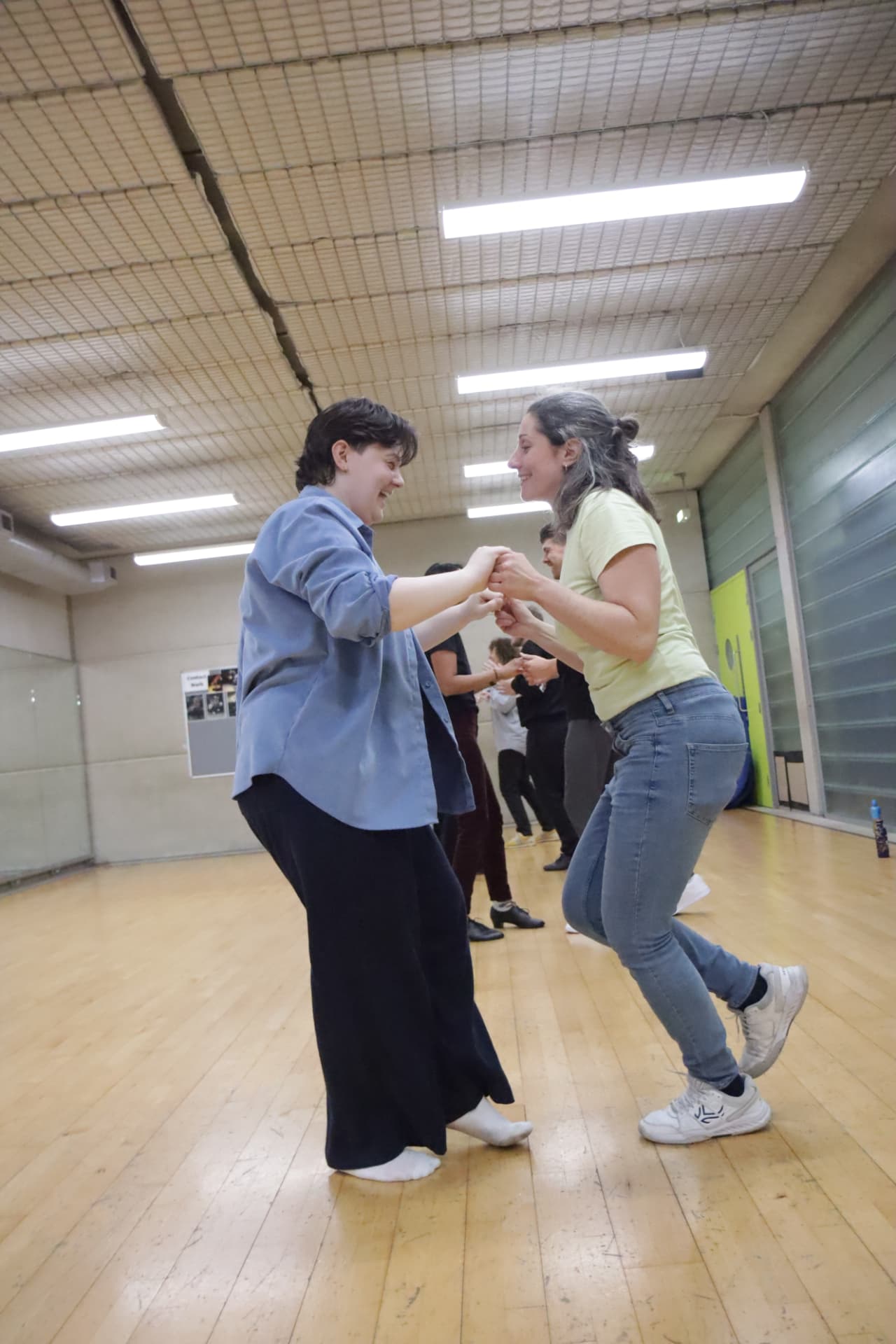 Students practising partnerwork in a This Is Salsa class